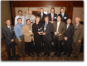 Smiles and trophies abound as A.M. Best Co. presents the recipient and top four finalists of the Second Annual E-Fusion Award. Back row, from left, are: Brian Emmen, Jeff Brown and Daniel W. Crandall, General Fire & Casualty Co.; Mark Birrell, Wildnet Group, and Mark Chapman, Global Aerospace (which submitted joint entry with Wildnet). Front row, from left, are: Paul C. Tinnirello, A.M. Best Co.; Charlie Blackorby and Sundeep Dronawat, Integrity Life Insurance Co; E-Fusion Award recipients Julie Klapstein and Daniel Chavez, Availity LLC; Jeff Goldberg, and Mark R. Harle, Marsh; and Lee McDonald, A.M. Best Co.