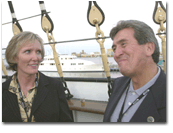 Julie Klapstein, chief executive officer of Availity, the recipient of this year's E-Fusion Award, chats with Daniel Chavez, vice president of operations for Availity, at the E-Fusion social on the deck of the Moshulu Restaurant, docked at Penn's Landing in Philadelphia.