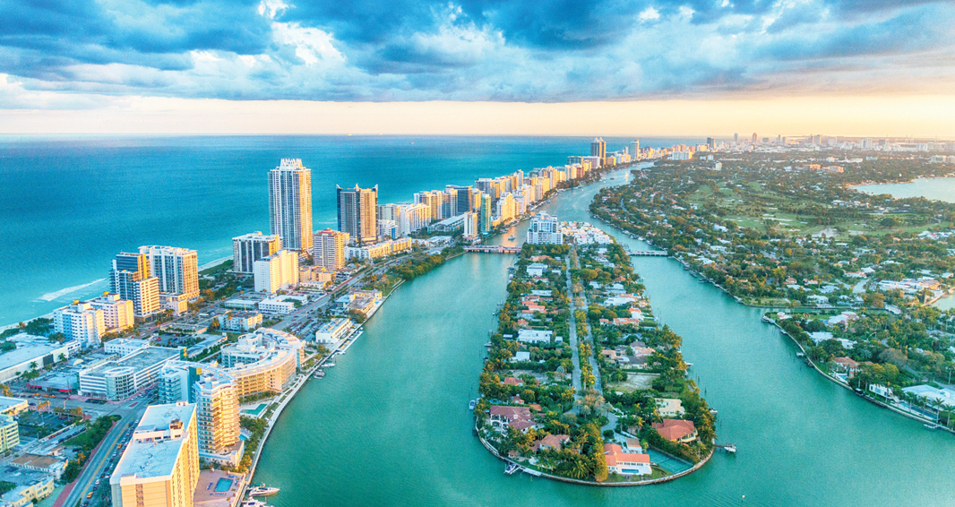 WATER, WATER EVERYWHERE: An aerial view of Miami. AM Best reports Florida’s personal property specialists show a significantly higher dependency on reinsurance than the industry average.