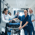 people in hospital hallway